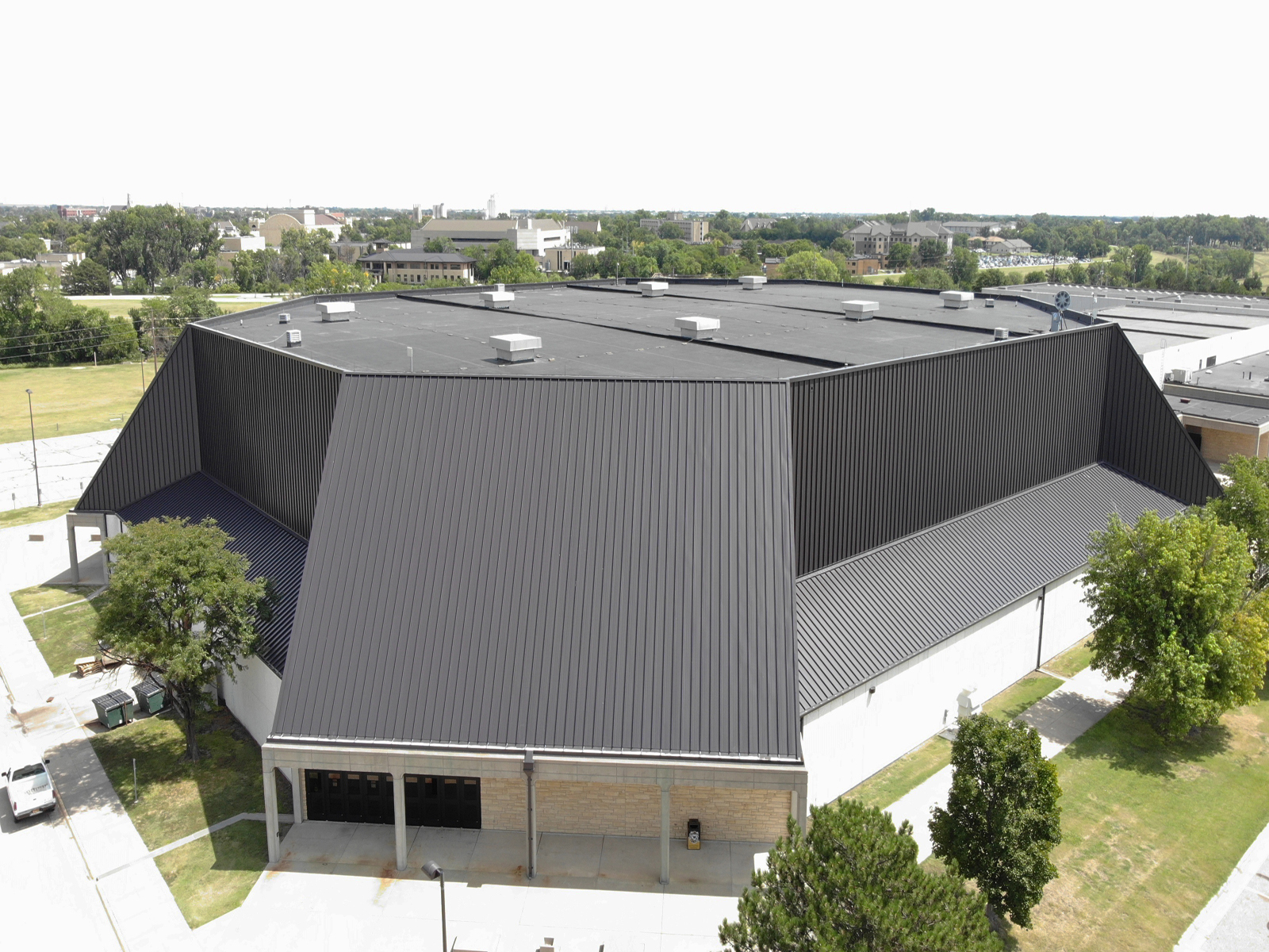 Academic Project uses standing seam panels as vertical wall