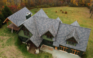 Distinctive Metal Roofing installed metal shingles on this beautiful home.