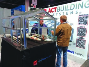 Interest in metal-framed buildings is growing. ACT Building Systems pre-engineers CFS buildings. The company’s booth featured a model building — and finished off the display with an X-Wing fighter and pilot. Photos courtesy of Shield Wall Media.