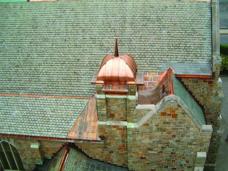 Crocker Architectural of Oxford, Massachusetts, uses hand seamers because owner David Crocker believes they do a better job, provide a tighter seal. Hand seaming also works better with specialty projects, like curved panels. CROCKER ARCHITECTURAL PHOTO