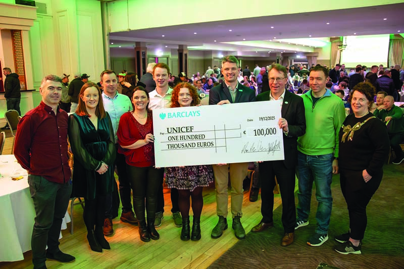 Combilift Co-Founder Martin McVicar presents a check for €100,000 to Owen Buckley of UNICEF and Michaela Plunkett, Business Development Manager. Photos courtesy of Combilift.
