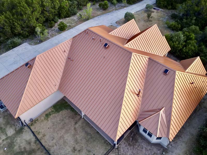 Copper Penny PVDF Standing Seam Roof Elevates Texas Hill Country Residence