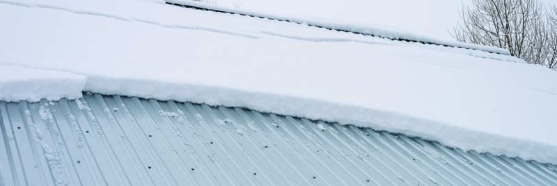 How Climate-Resilient Metal Roofing Can Improve Building Performance and Insurability